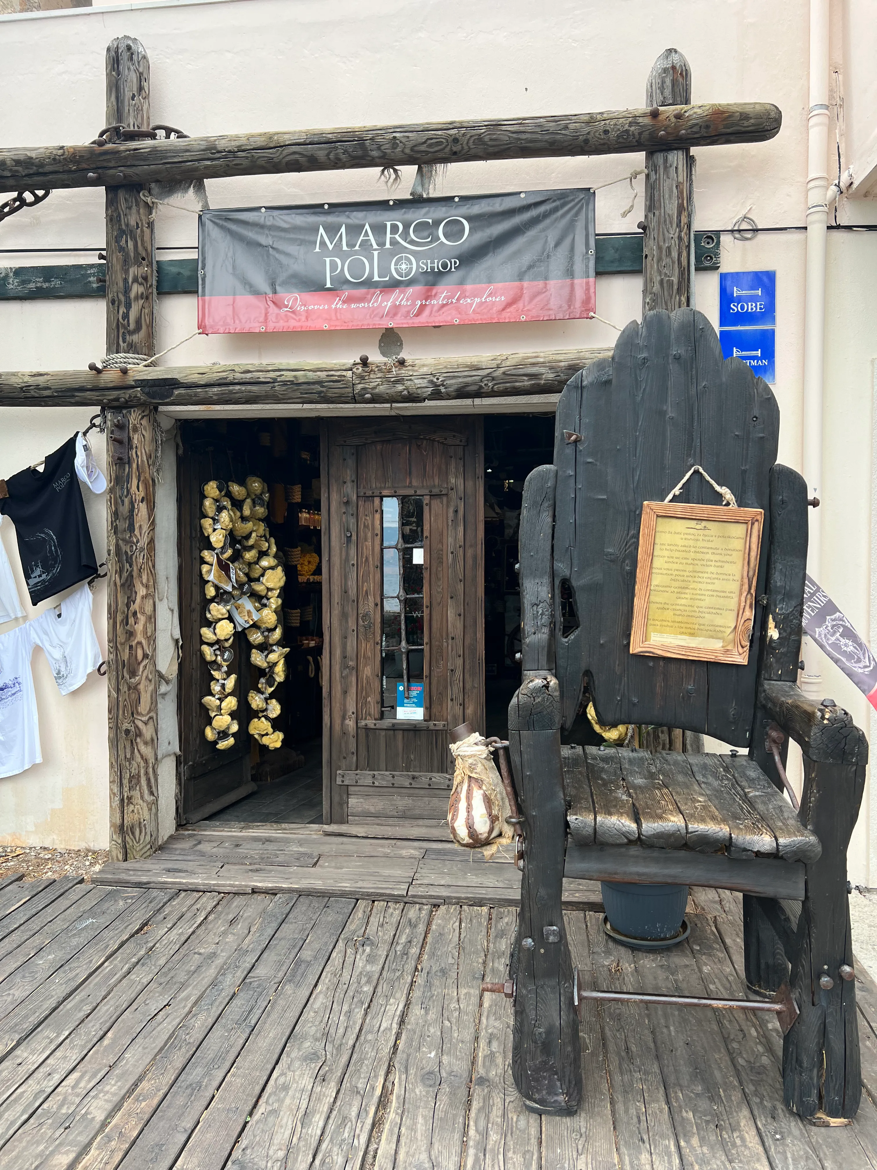 Marco Polo souvenir shop entrance in KorcÌula old town, Croatia.jpg